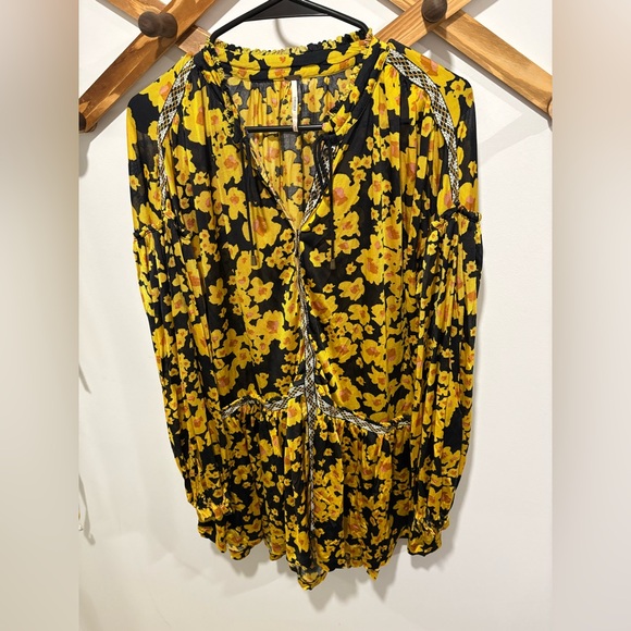 Free People Love Letter Floral Tunic Blouse in a black and yellow floral print. - Picture 2 of 11
